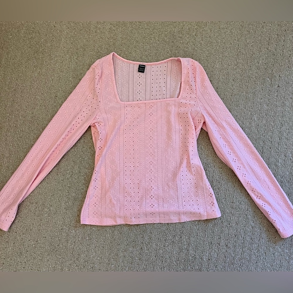 Pink pointelle pattern long sleeve top
